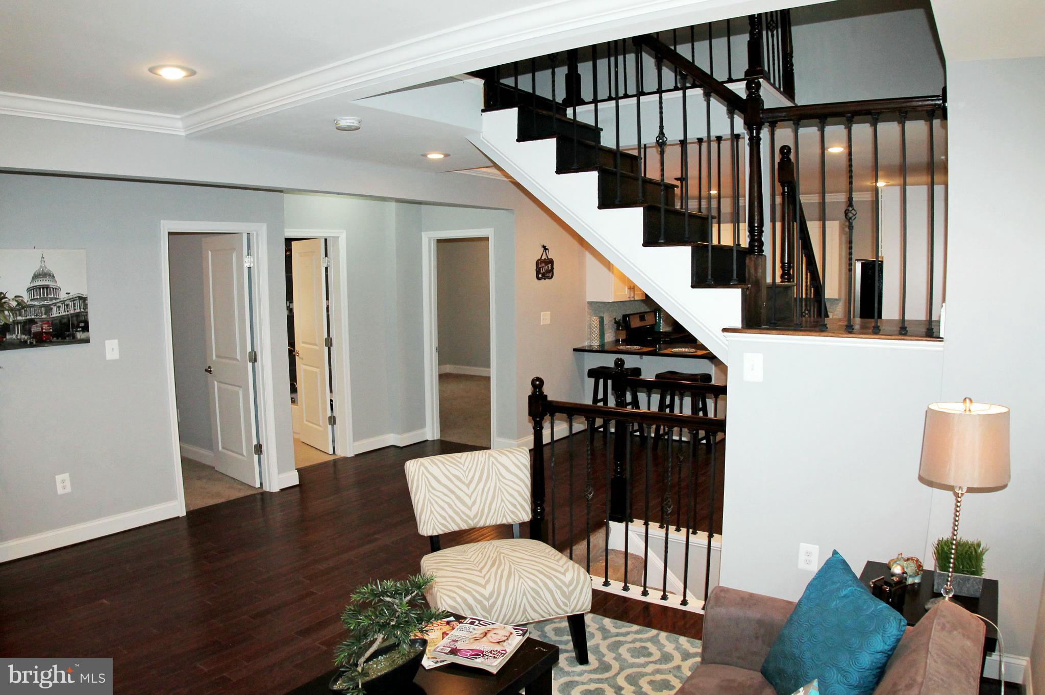 5510 Tramore Road Baltimore, MD 21214 - Photo 6 of 30 a view of entryway and hall with wooden floor
