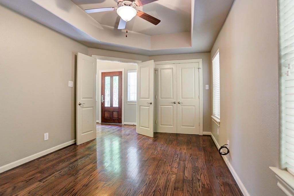 923 Birdsall Street Houston, TX 77007 - Photo 15 of 21 wooden floor in an empty room with a window