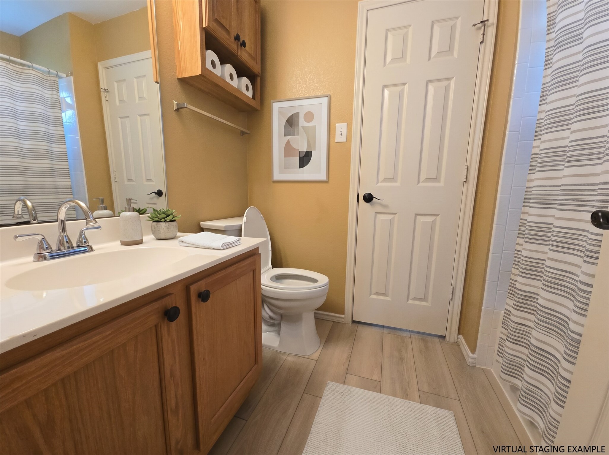 815 Bogart Road Cedar Park, TX 78613 - Photo 11 of 14 Functional primary bathroom features a light-colored vanity and easy-to-maintain flooring.