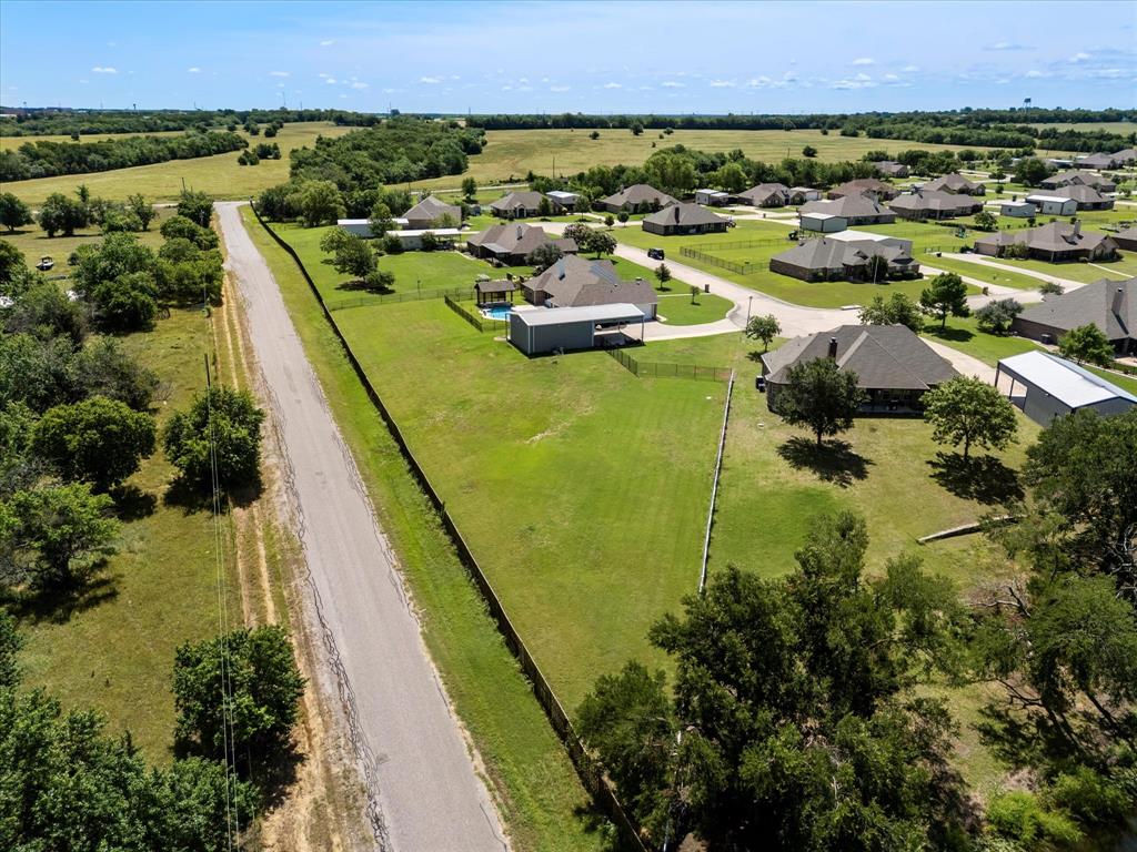 528 Hubbard Circle Nevada, TX 75173 - Photo 19 of 36 Aerial perspective of suburban area