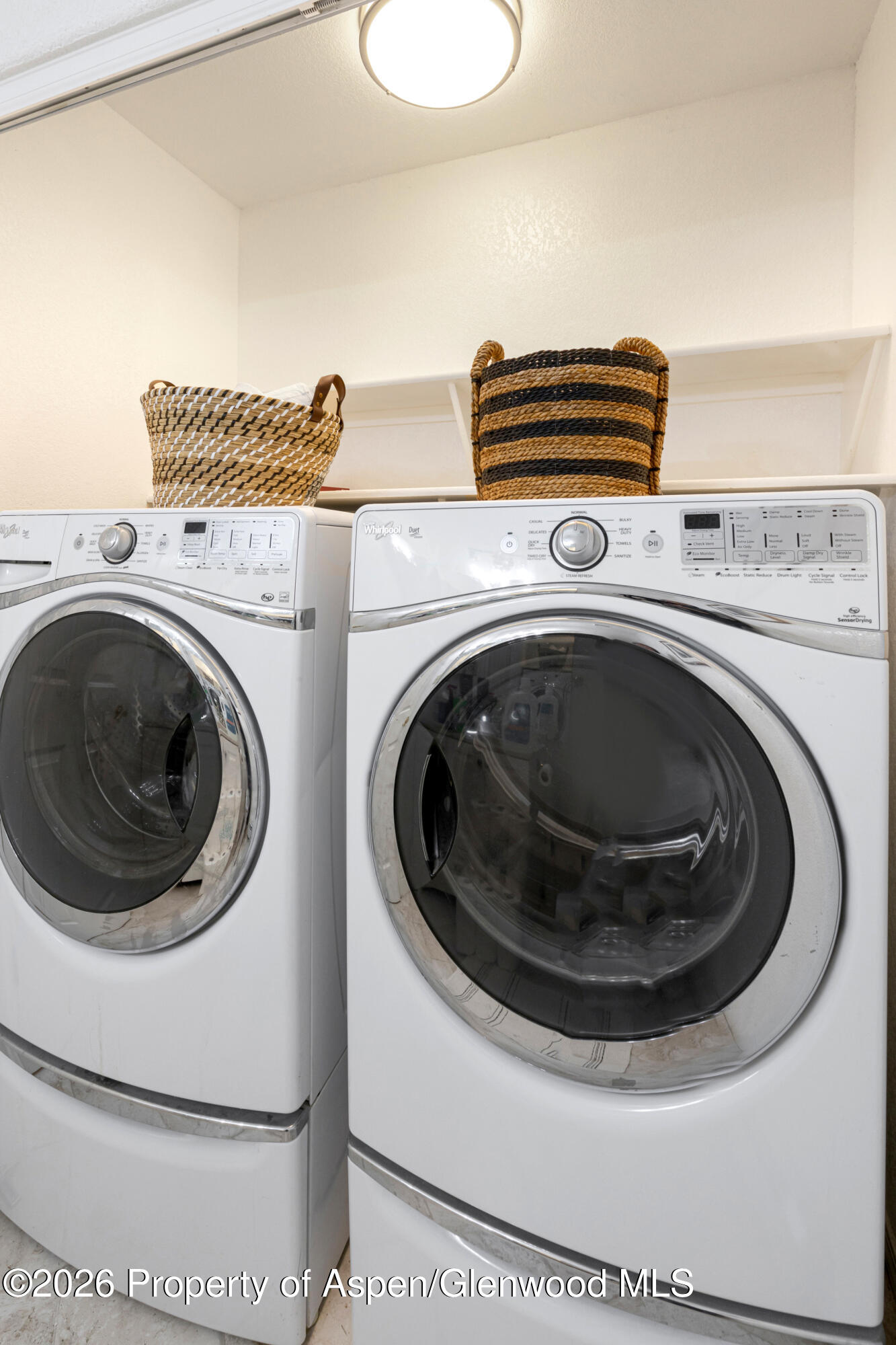 14 West Ridge Court Battlement Mesa, CO 81635 - Photo 20 of 30 washer and dryer in bathroom