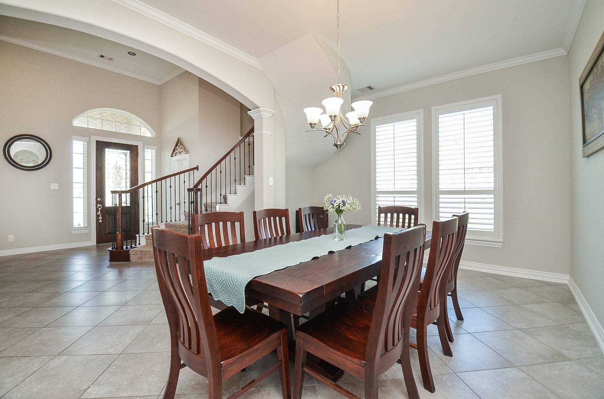 2714 Topaz Cove Lane Rosharon, TX 77583 - Photo 14 of 50 a view of a dining room with furniture and a chandelier