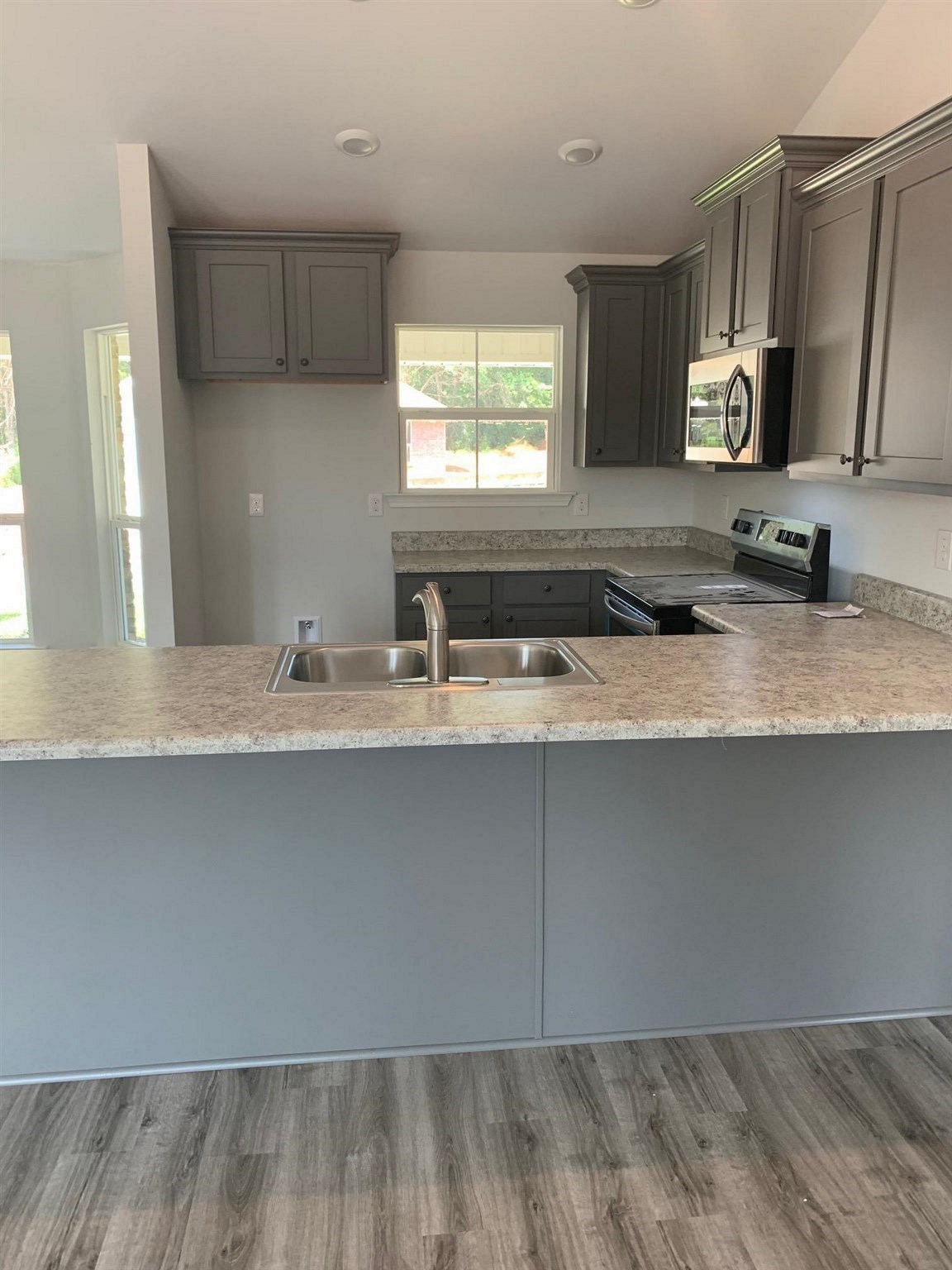 16196 Wishing Tree Court Foley, AL 36535 - Photo 5 of 6 kitchen flat bar