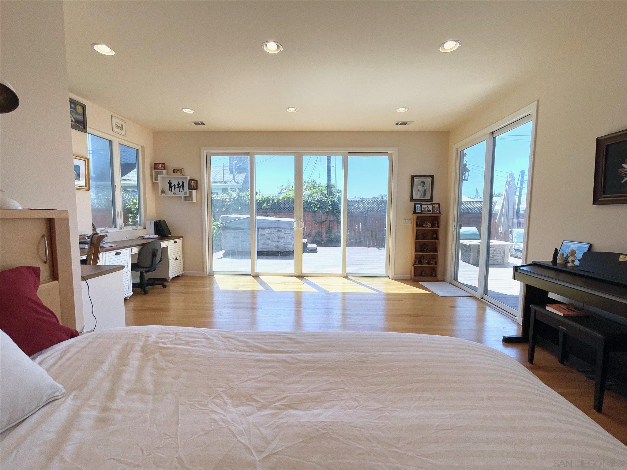 950 Cabrillo Avenue Coronado, CA 92118 - Photo 15 of 31 a view of a living room kitchen and a large window