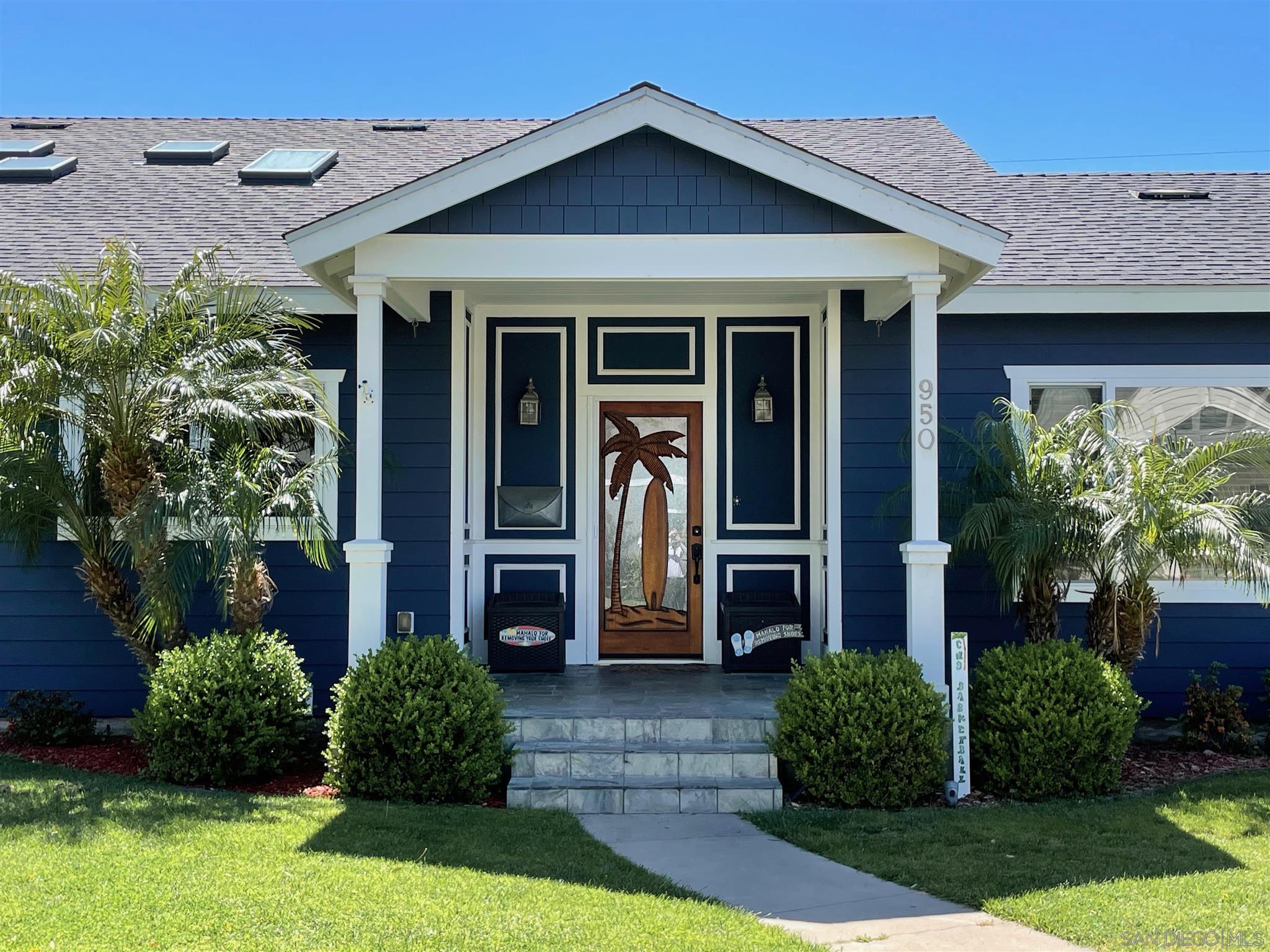 950 Cabrillo Avenue Coronado, CA 92118 - Photo 2 of 31 a front view of a house with garden