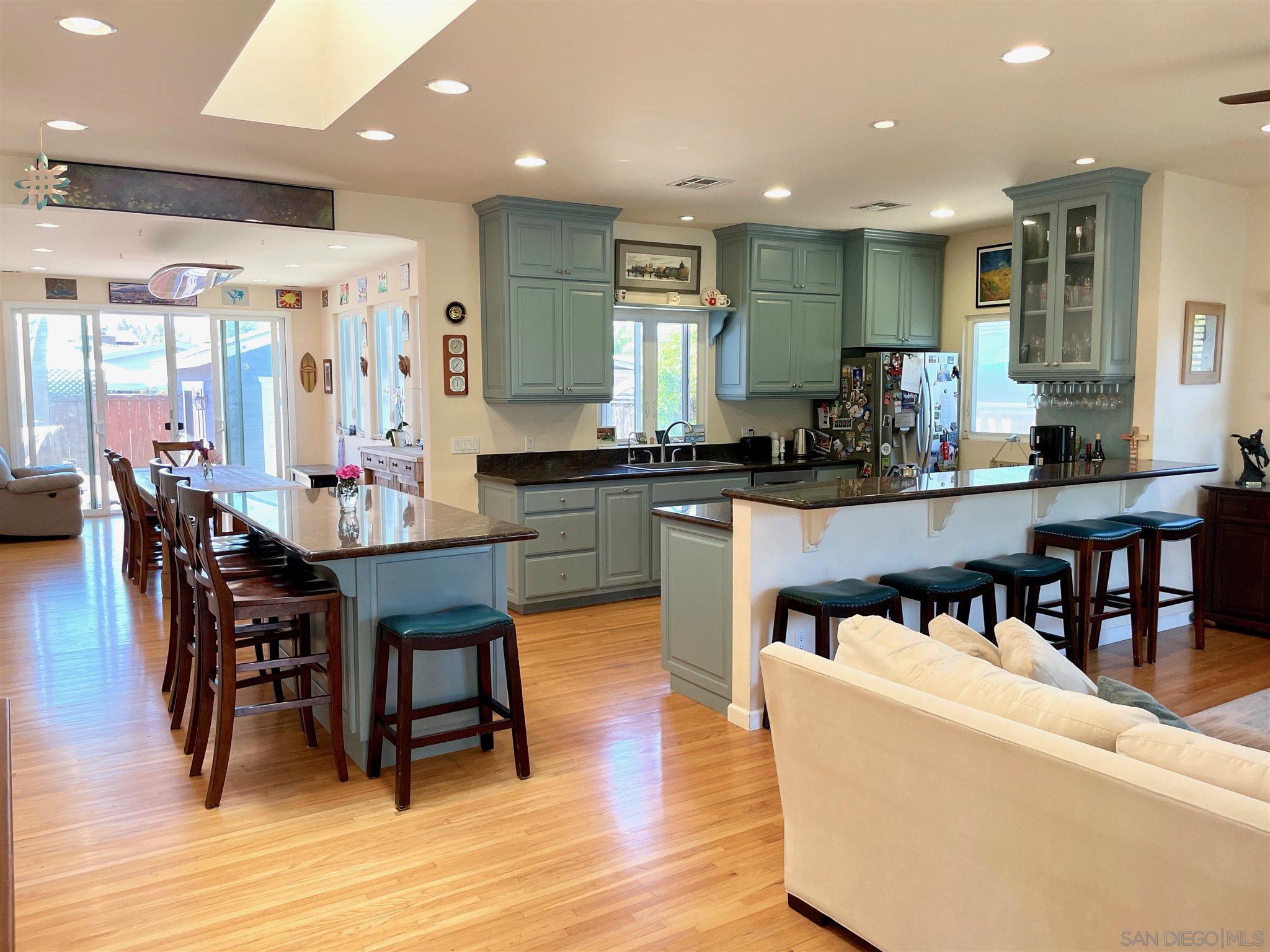 950 Cabrillo Avenue Coronado, CA 92118 - Photo 4 of 31 a kitchen with lots of counter and chairs