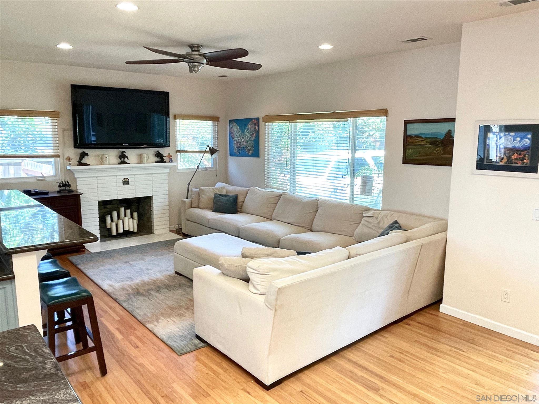 950 Cabrillo Avenue Coronado, CA 92118 - Photo 7 of 31 a living room with furniture fireplace and flat screen tv
