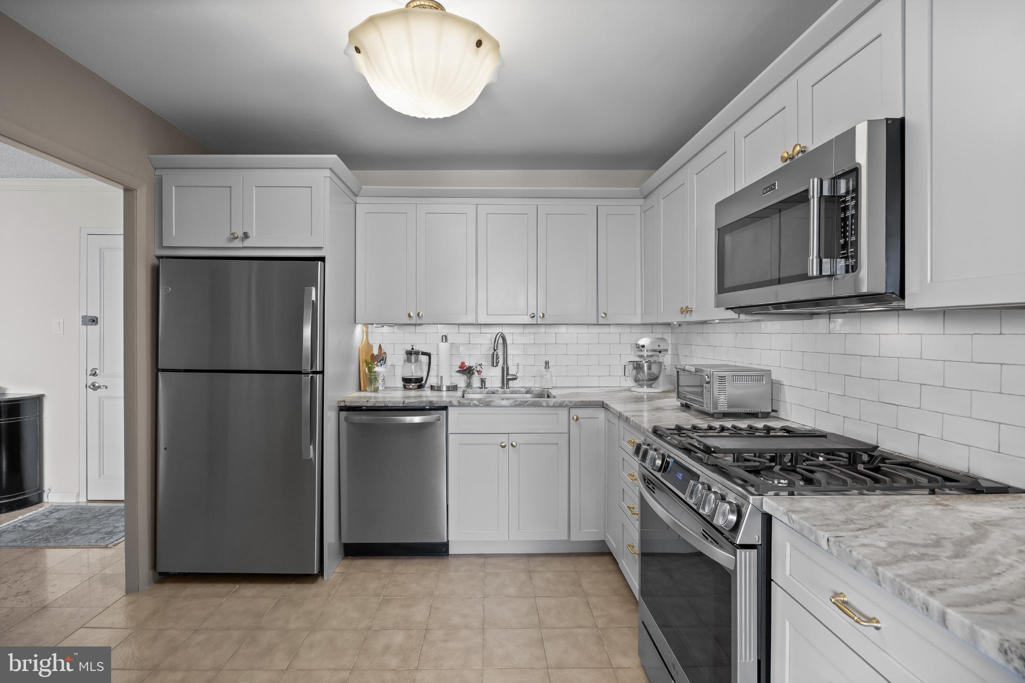 1840 Frontage Road, Unit 1704 Cherry Hill, NJ 08034 - Photo 14 of 39 Modern kitchen with sleek finishes.