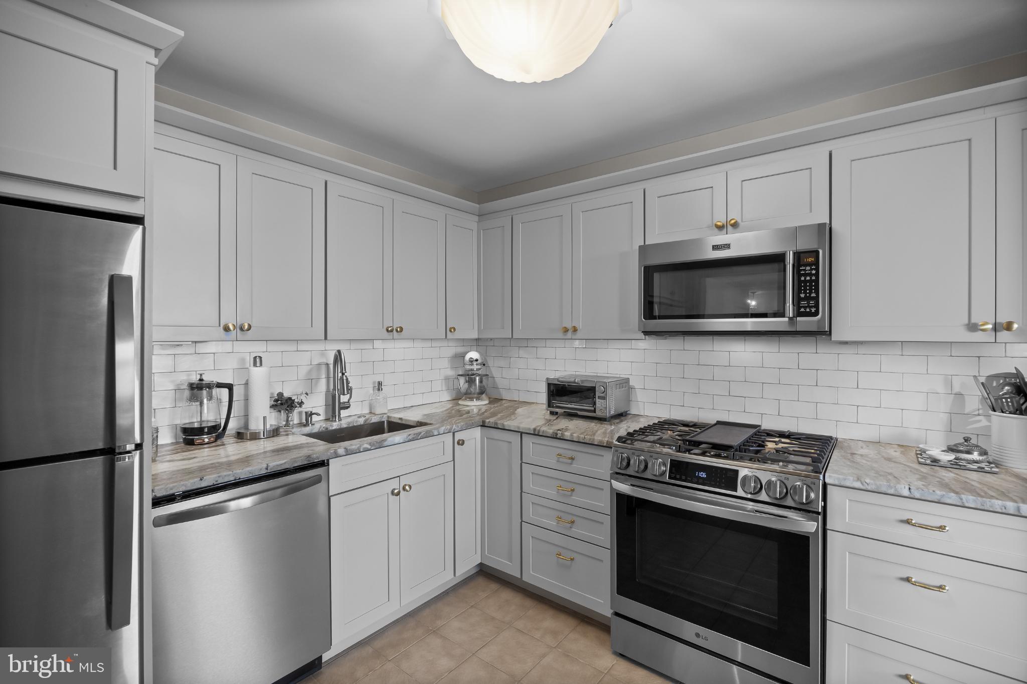 1840 Frontage Road, Unit 1704 Cherry Hill, NJ 08034 - Photo 15 of 39 Modern kitchen with updated cabinetry.