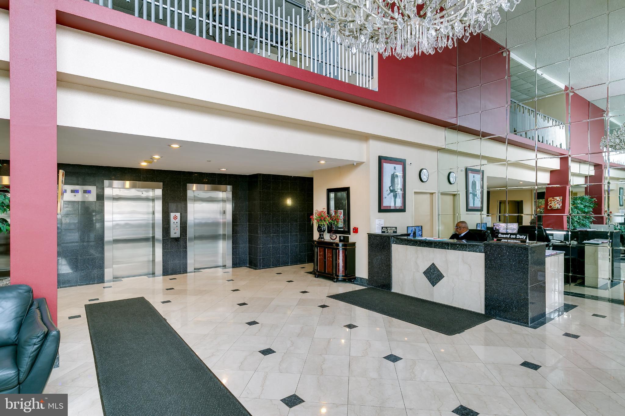 1840 Frontage Road, Unit 1704 Cherry Hill, NJ 08034 - Photo 4 of 39 Elegant staffed lobby with modern design elements.