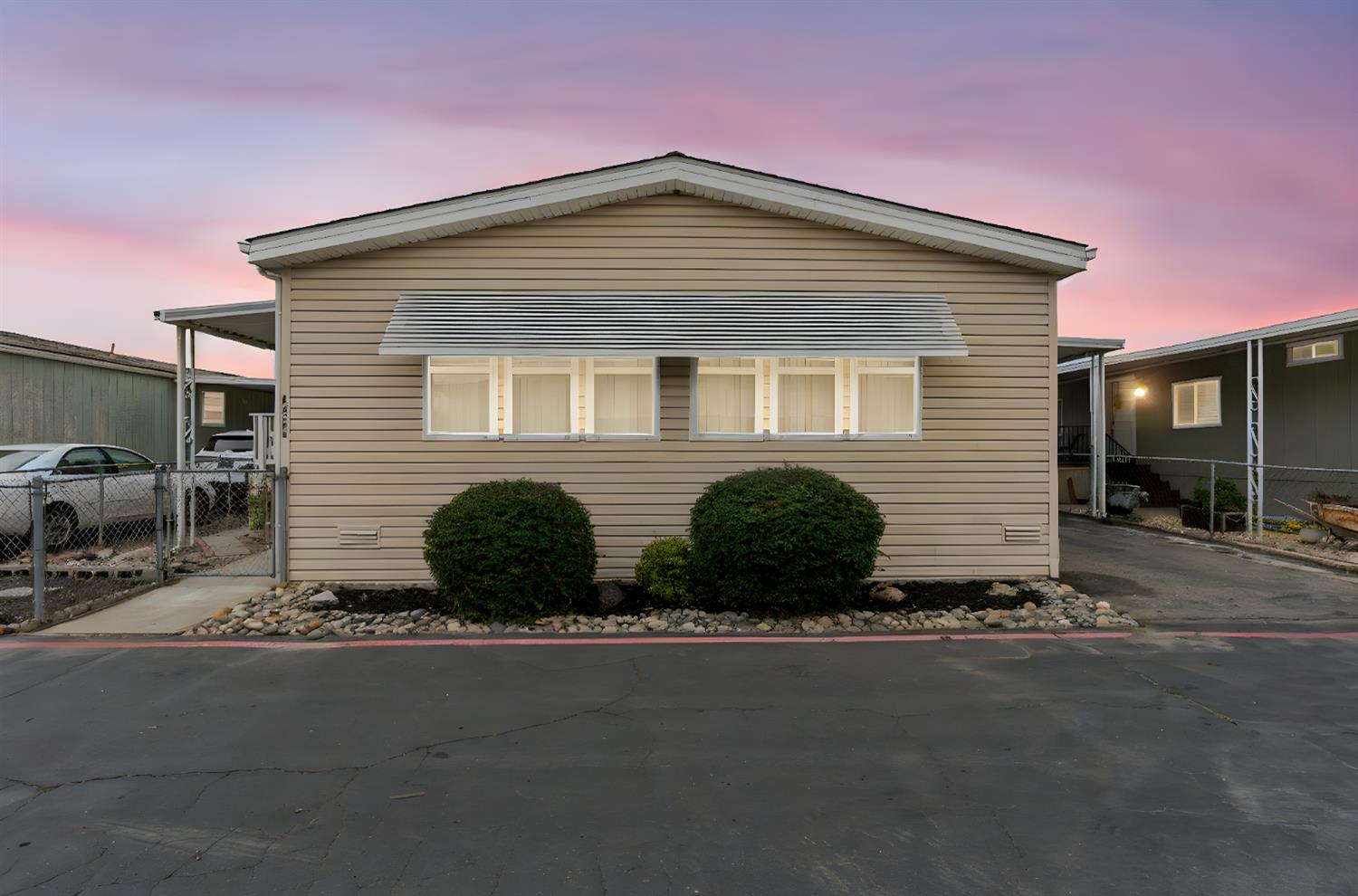 a front view of a house with yard