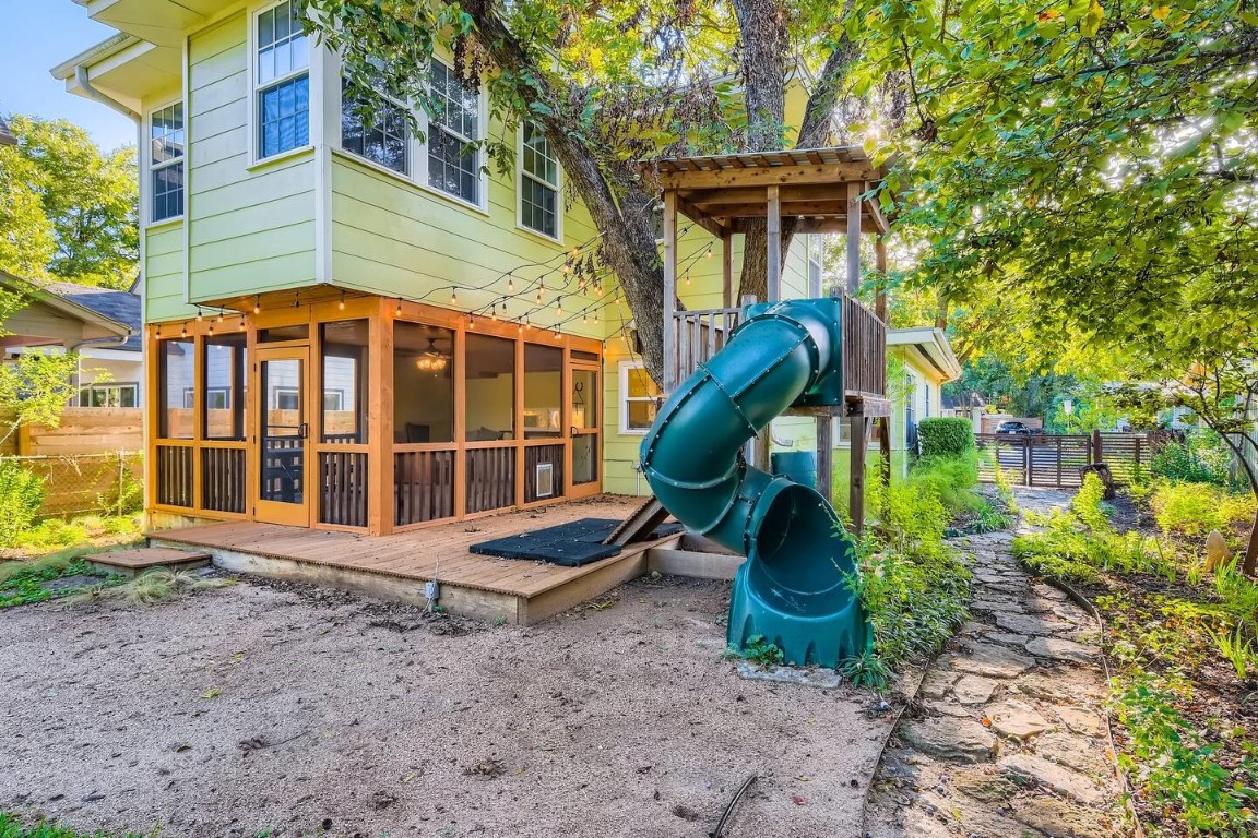 2704 Stacy Lane Austin, TX 78704 - Photo 14 of 15 Community play area with a deck and a sunroom