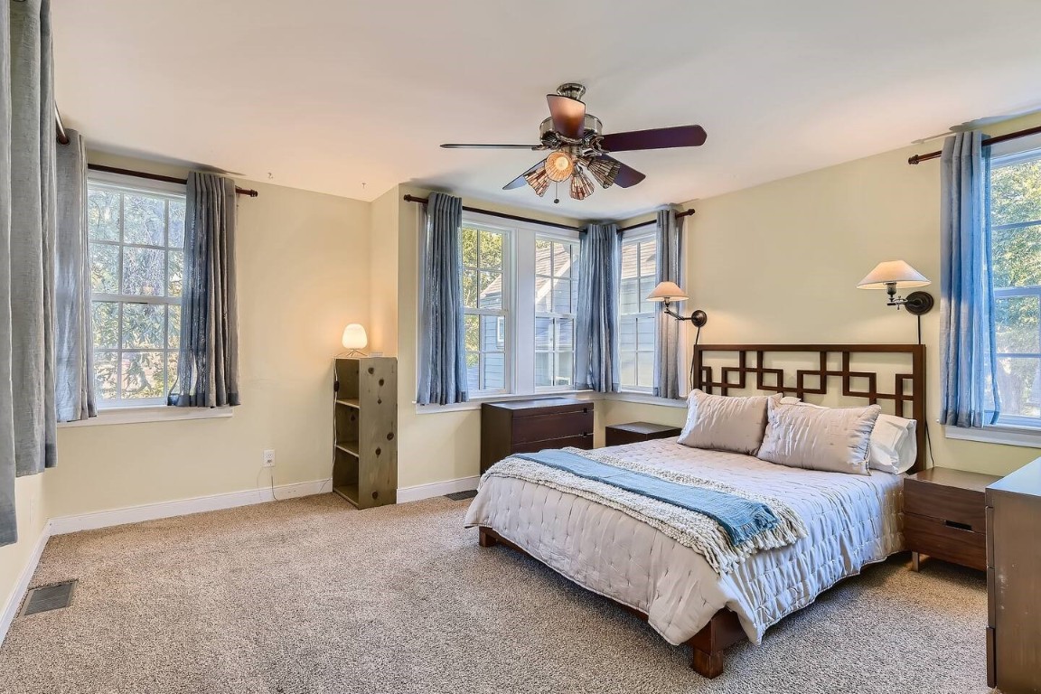 2704 Stacy Lane Austin, TX 78704 - Photo 9 of 15 Bedroom featuring carpet and ceiling fan