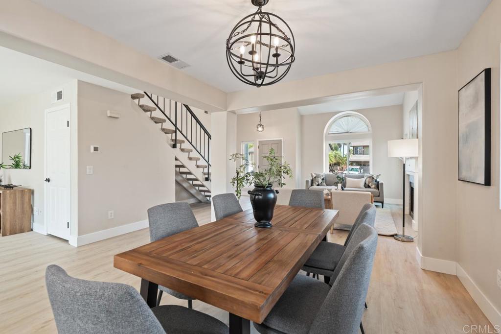 536 Heather Ridge Road San Marcos, CA 92078 - Photo 14 of 66 a view of a dining room with furniture window and wooden floor
