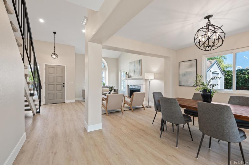 536 Heather Ridge Road San Marcos, CA 92078 - Photo 15 of 66 a view of a dining room with furniture window and wooden floor