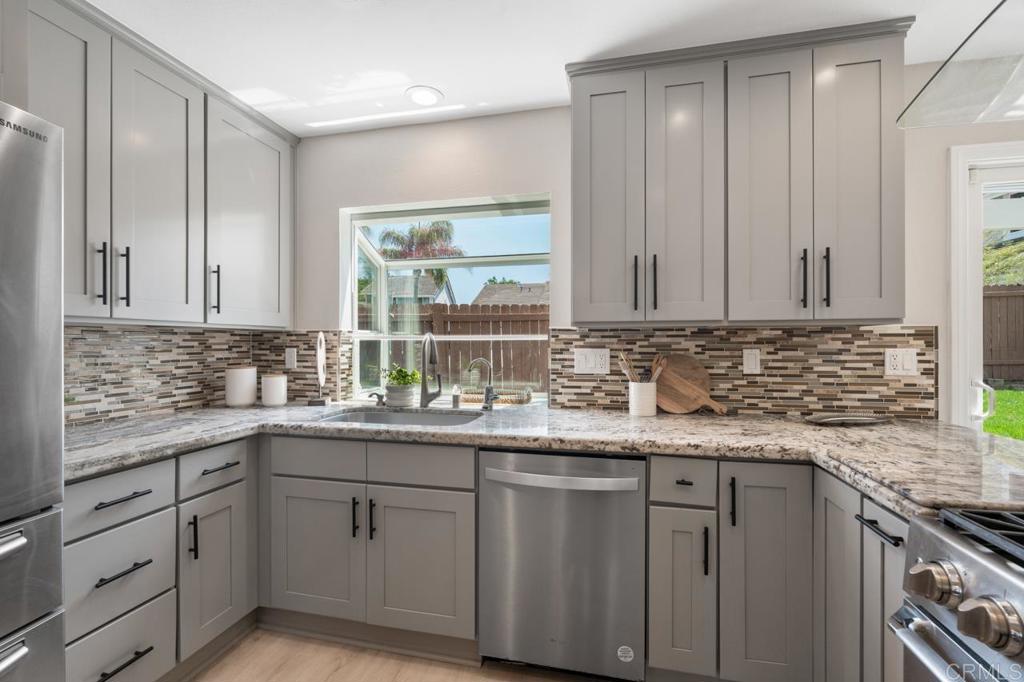 536 Heather Ridge Road San Marcos, CA 92078 - Photo 20 of 66 a kitchen with sink cabinets and window