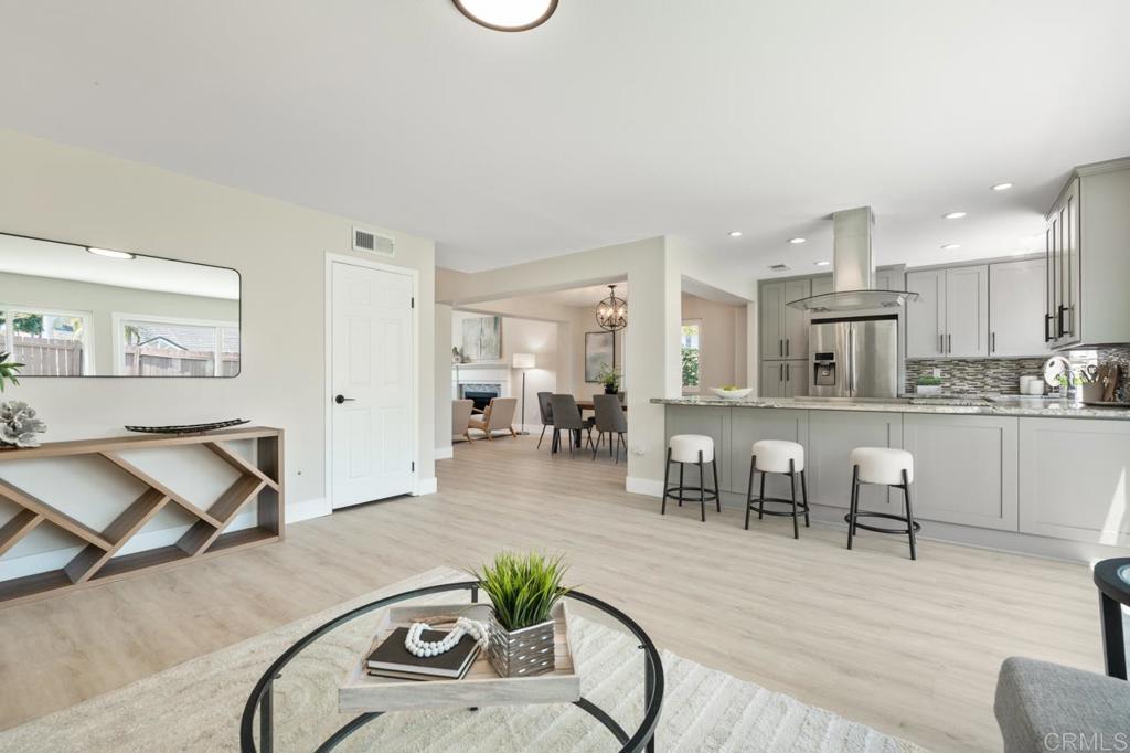 536 Heather Ridge Road San Marcos, CA 92078 - Photo 32 of 66 a living room with furniture and kitchen view