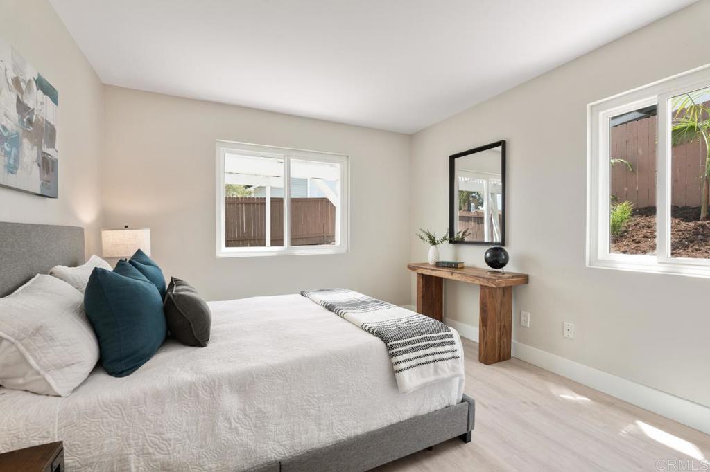 536 Heather Ridge Road San Marcos, CA 92078 - Photo 33 of 66 a bedroom with a large bed and a window