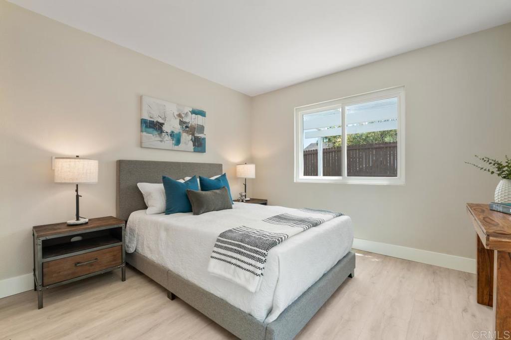 536 Heather Ridge Road San Marcos, CA 92078 - Photo 34 of 66 a bedroom with a bed and a window
