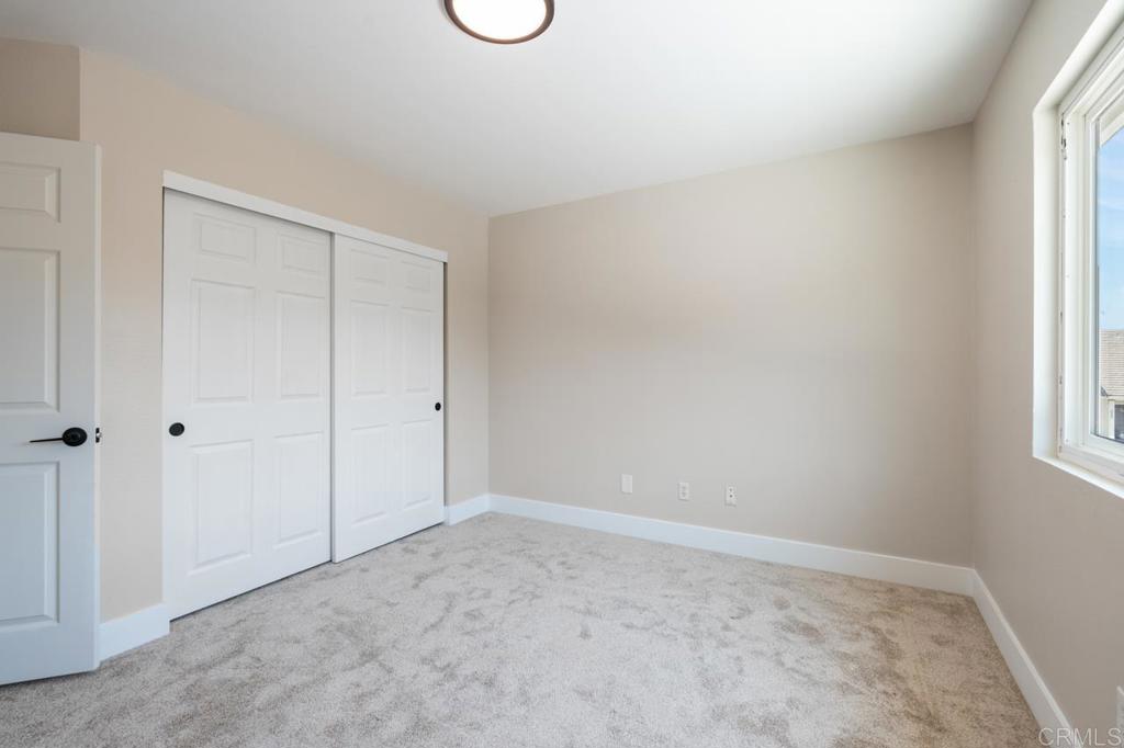 536 Heather Ridge Road San Marcos, CA 92078 - Photo 45 of 66 a view of an empty room and a window