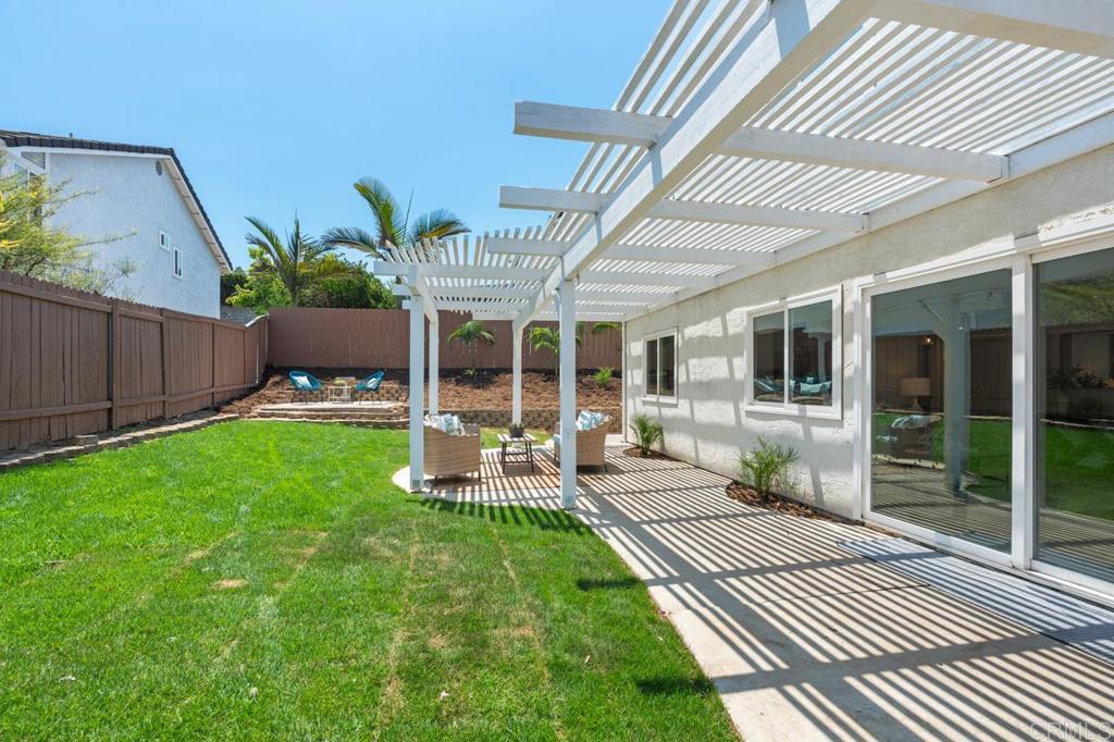 536 Heather Ridge Road San Marcos, CA 92078 - Photo 55 of 66 a view of a house with backyard and porch