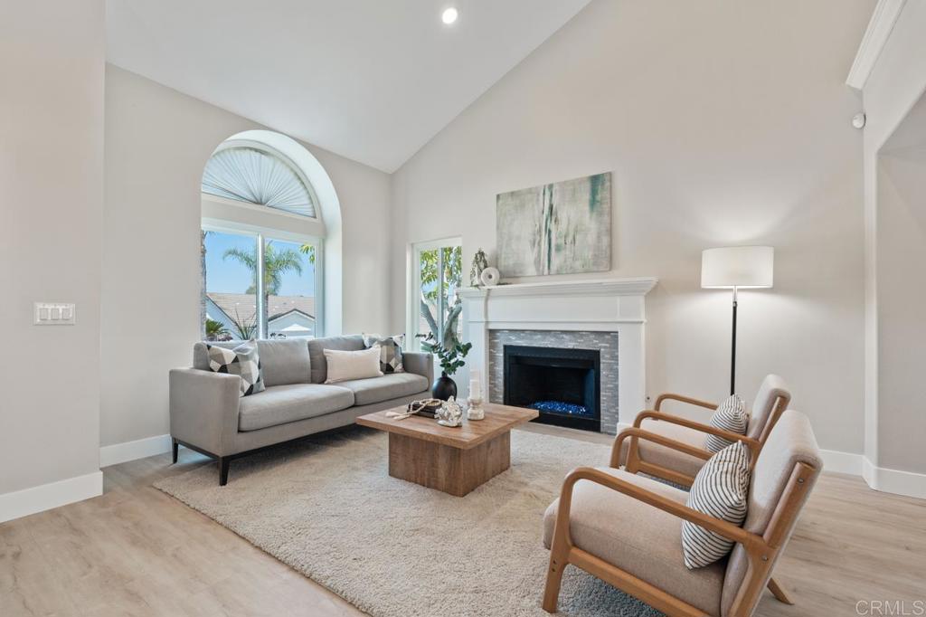 536 Heather Ridge Road San Marcos, CA 92078 - Photo 7 of 66 a living room with furniture and a fireplace