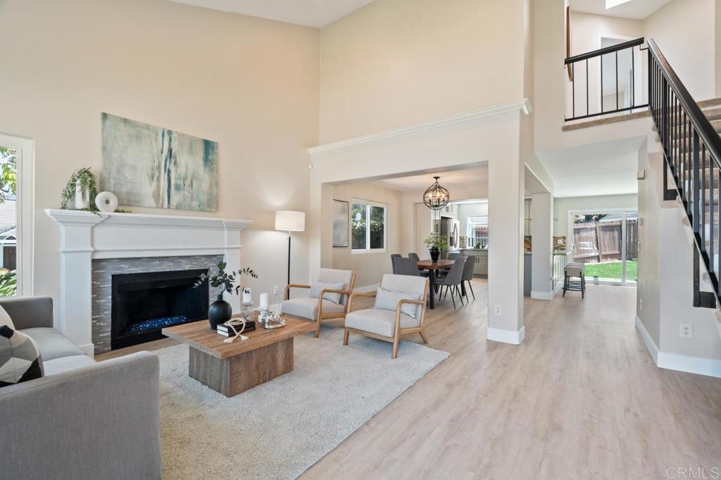 536 Heather Ridge Road San Marcos, CA 92078 - Photo 8 of 66 a living room with furniture and a fireplace