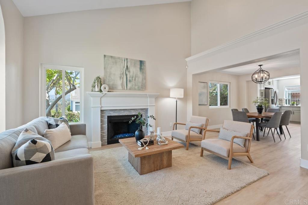 536 Heather Ridge Road San Marcos, CA 92078 - Photo 9 of 66 a living room with furniture and a fireplace