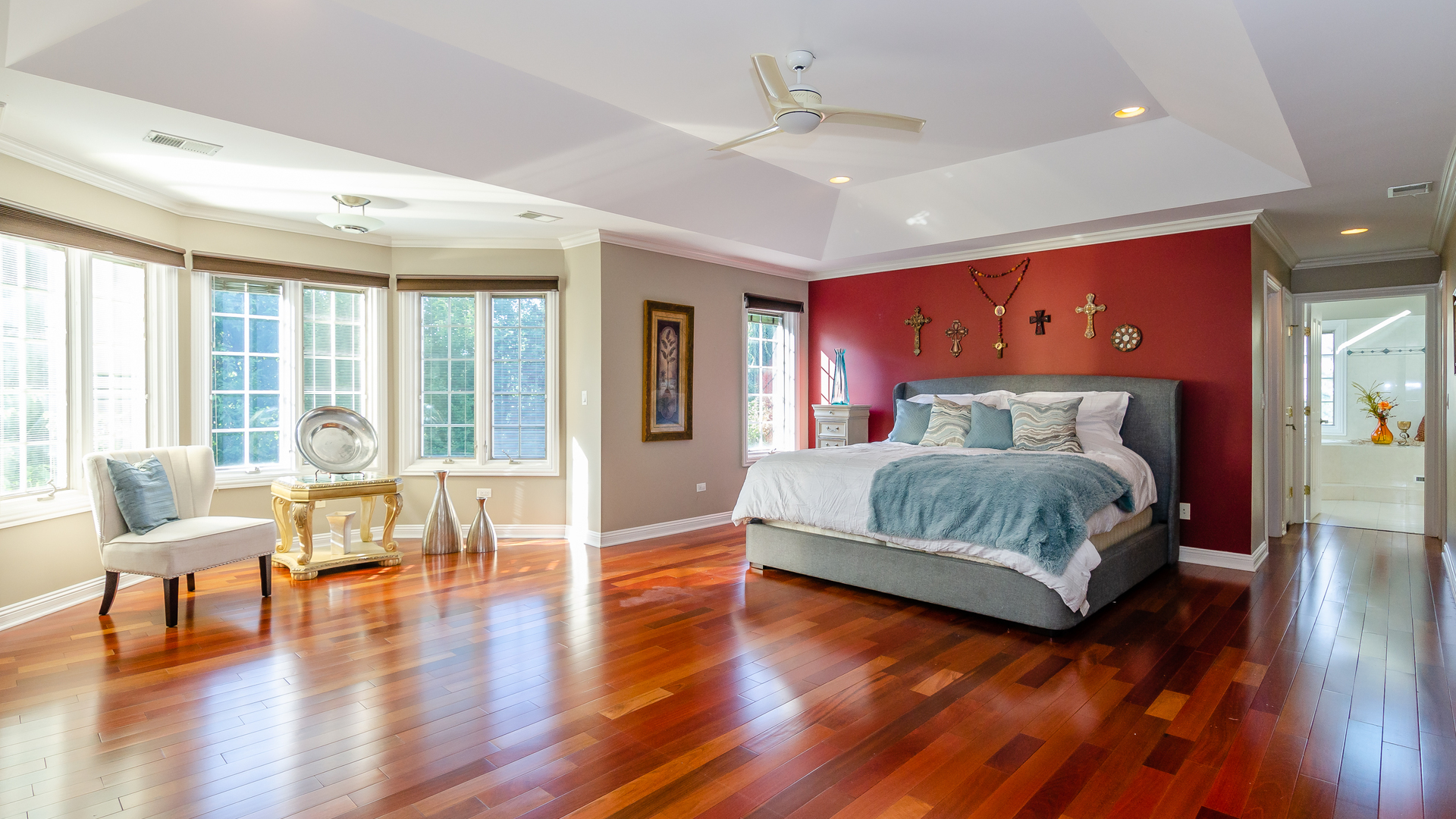 6919 Fieldstone Drive Burr Ridge, IL 60527 - Photo 28 of 58 a bedroom with a large bed a rug and a large window