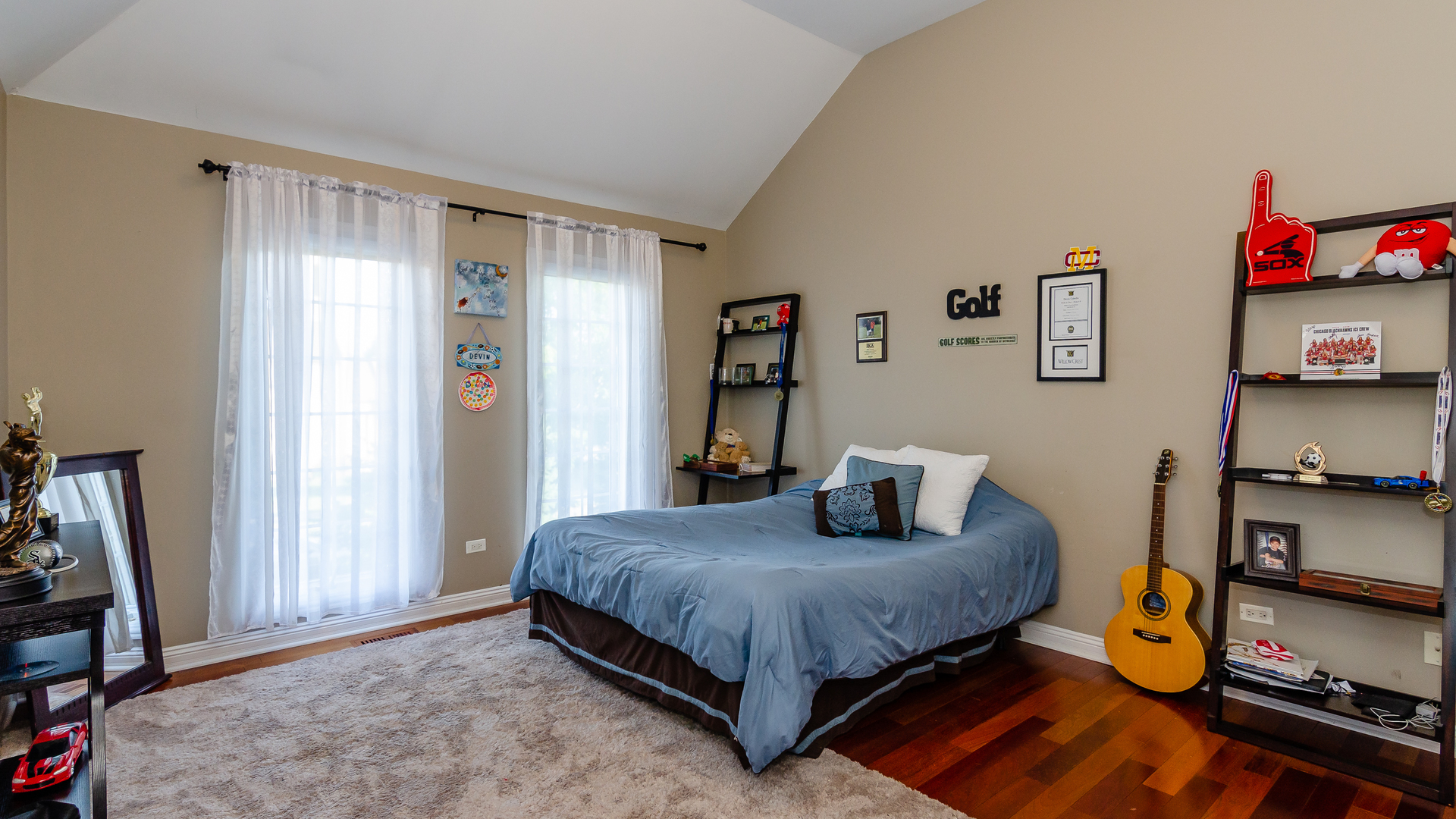6919 Fieldstone Drive Burr Ridge, IL 60527 - Photo 34 of 58 a bedroom with a bed and a window