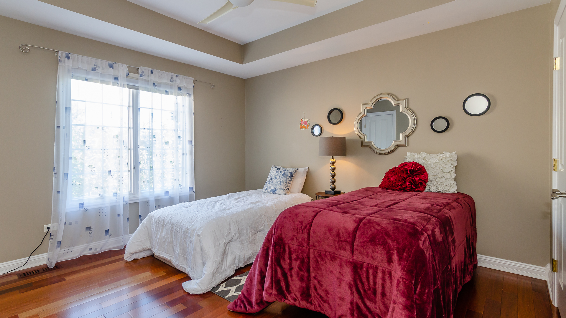 6919 Fieldstone Drive Burr Ridge, IL 60527 - Photo 38 of 58 a bedroom with a bed and a window