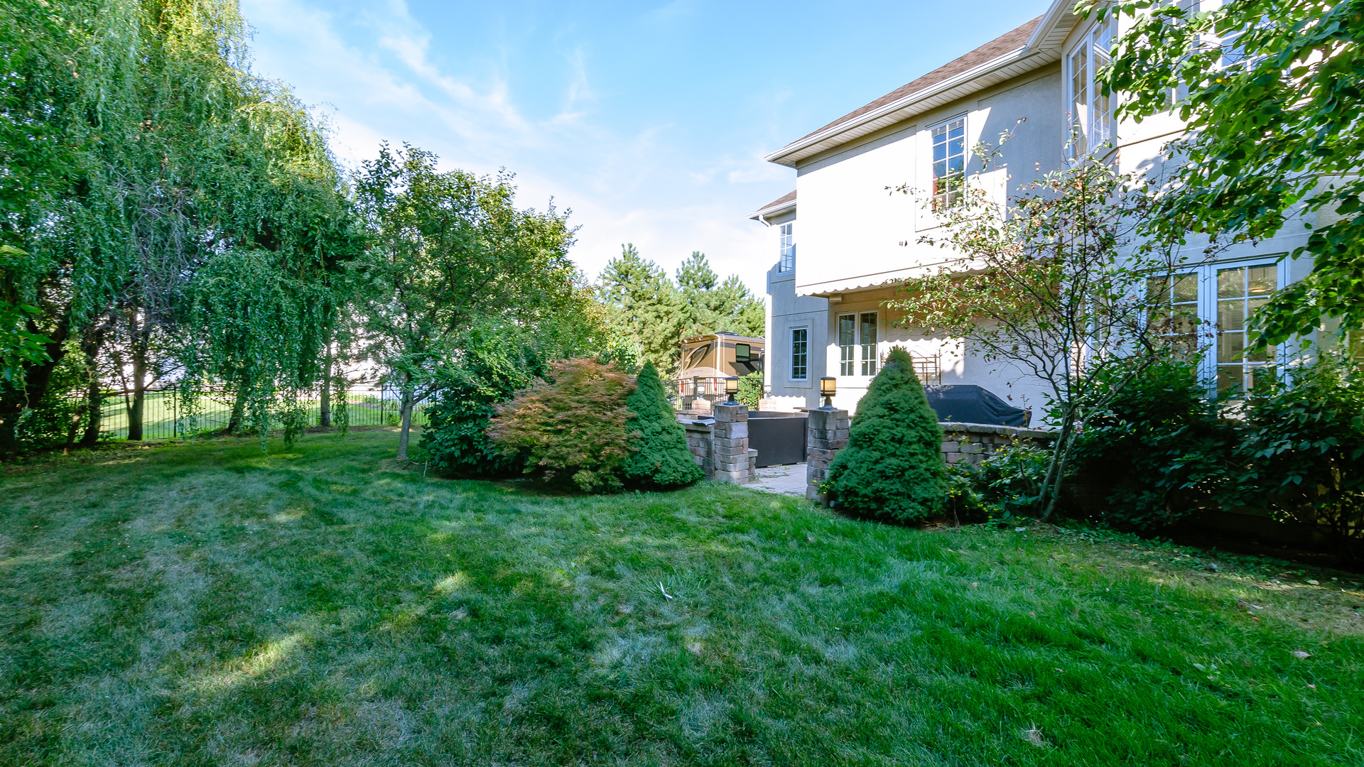 6919 Fieldstone Drive Burr Ridge, IL 60527 - Photo 54 of 58 a view of backyard with garden and trees