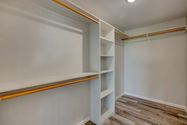 a view of closet with empty racks