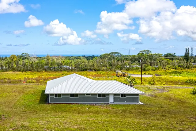 a view of a swimming pool with an ocean
