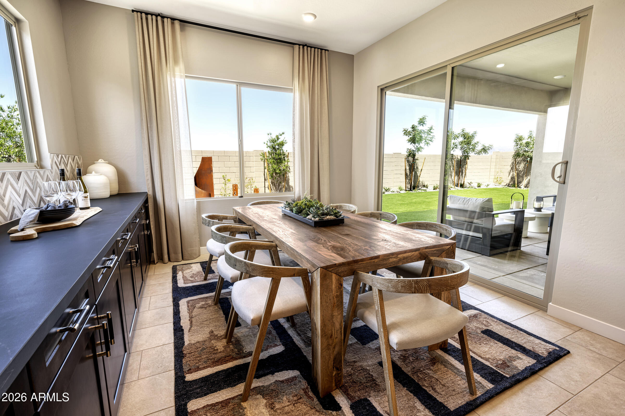 686 West Treasure Trail Apache Junction, AZ 85120 - Photo 4 of 15 a view of a dining room with furniture window and outside view