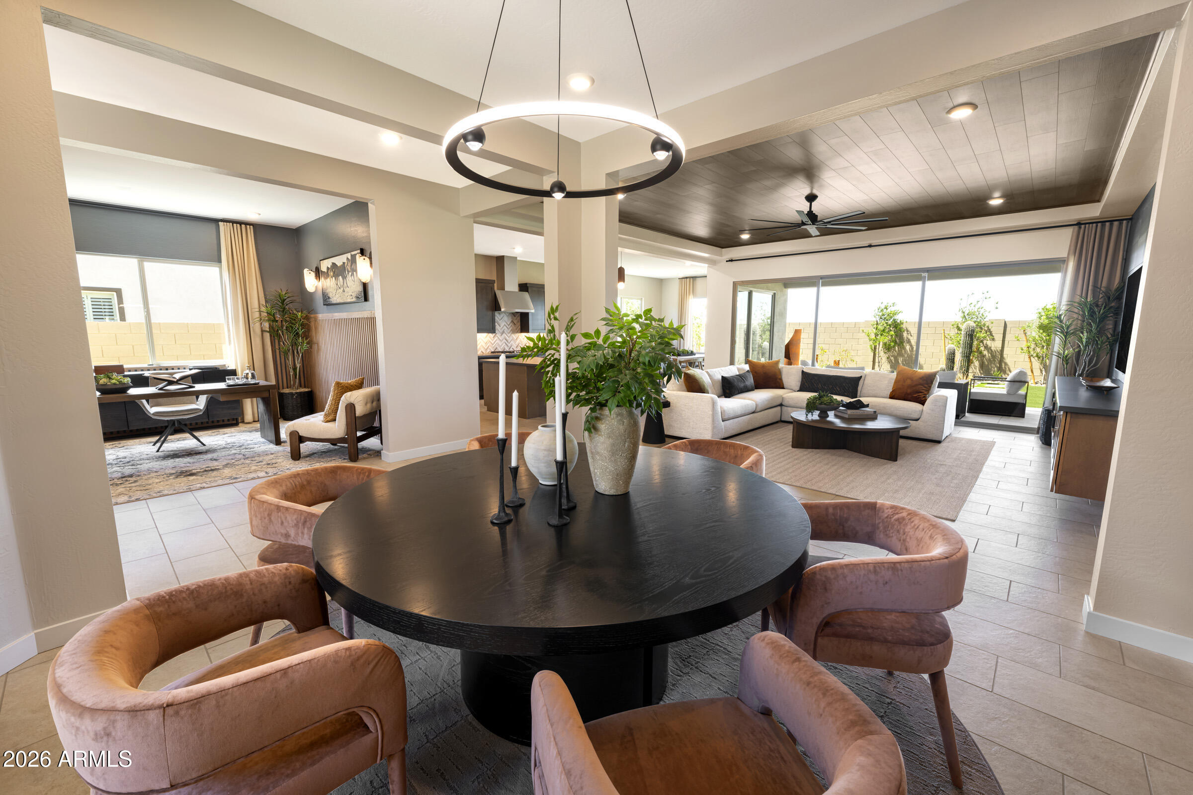 686 West Treasure Trail Apache Junction, AZ 85120 - Photo 5 of 15 a view of a dining room with furniture and chandelier