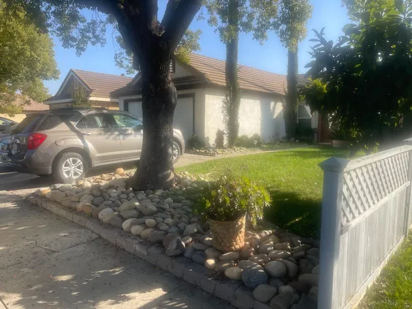 a front view of a house having yard
