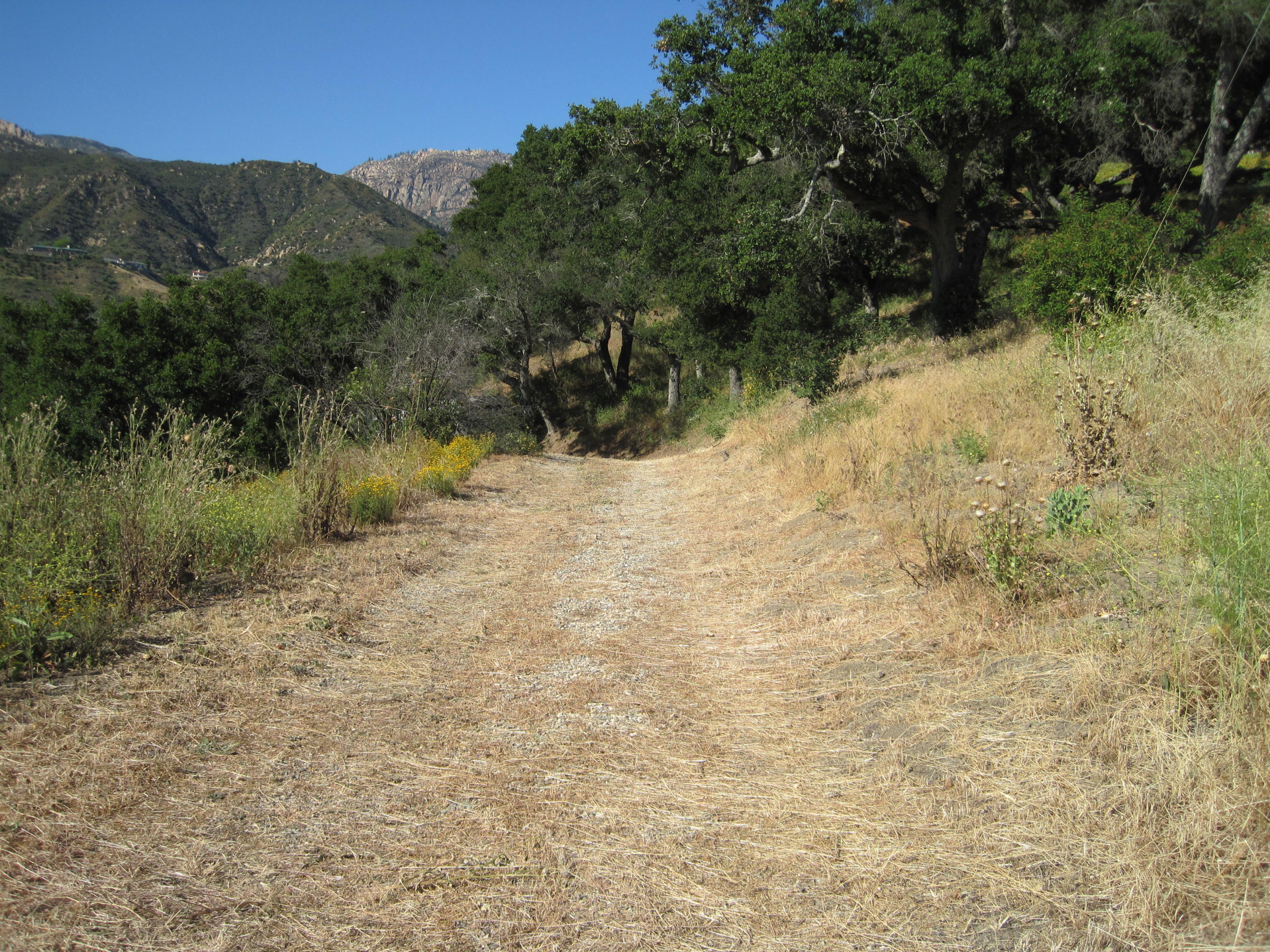 1550 San Roque Road Santa Barbara, CA 93105 - Photo 2 of 5 a view of a lake with mountains in the background