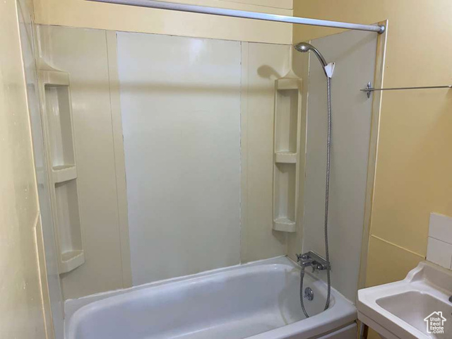 642 East 700 North Logan, UT 84321 - Photo 17 of 33 Bathroom with shower / washtub combination and a sink