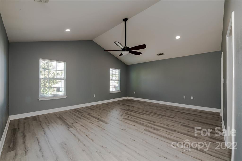 722 Overlook Road Lowell, NC 28098 - Photo 11 of 22 a view of an empty room with a window