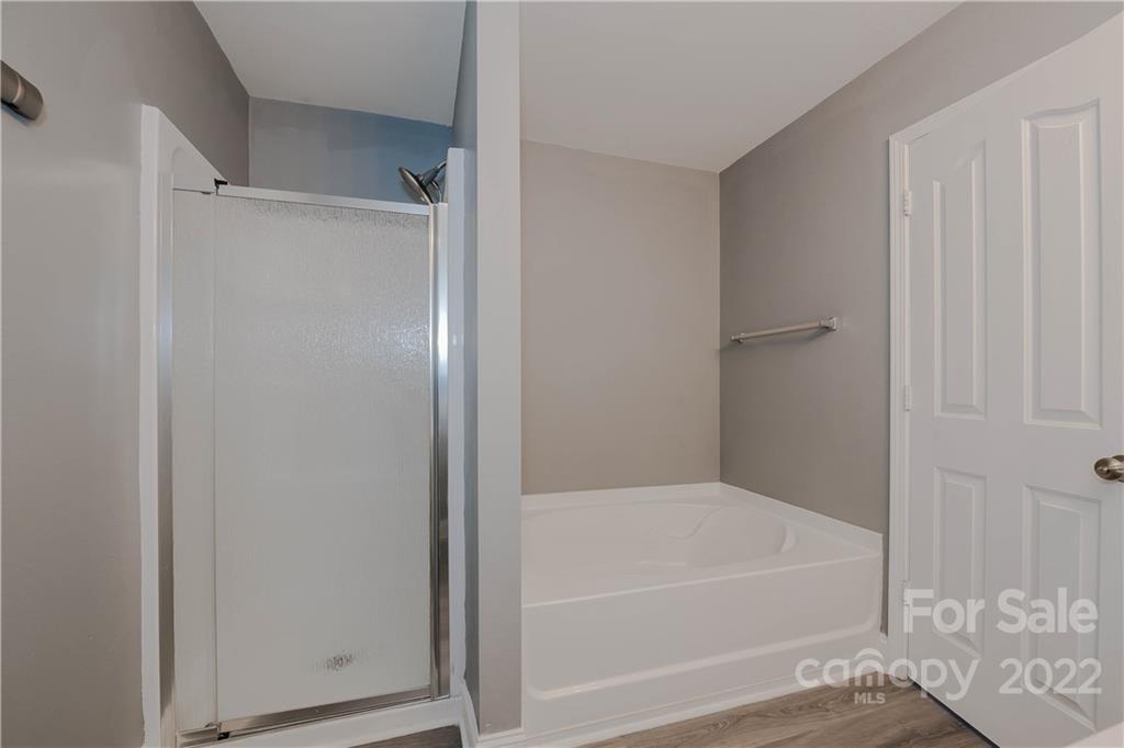 722 Overlook Road Lowell, NC 28098 - Photo 14 of 22 a bathroom with a bathtub