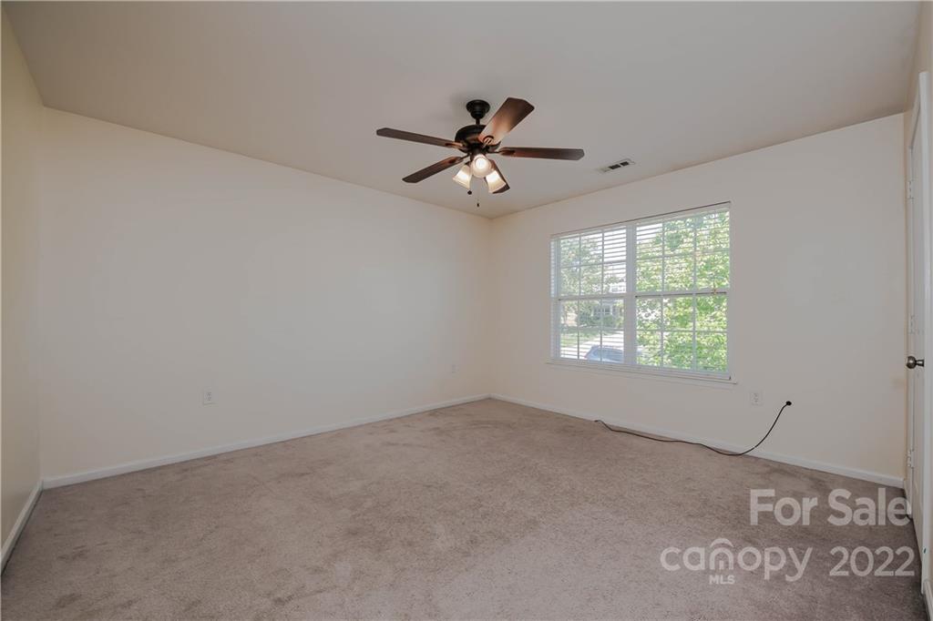 722 Overlook Road Lowell, NC 28098 - Photo 15 of 22 a view of an empty room with a window