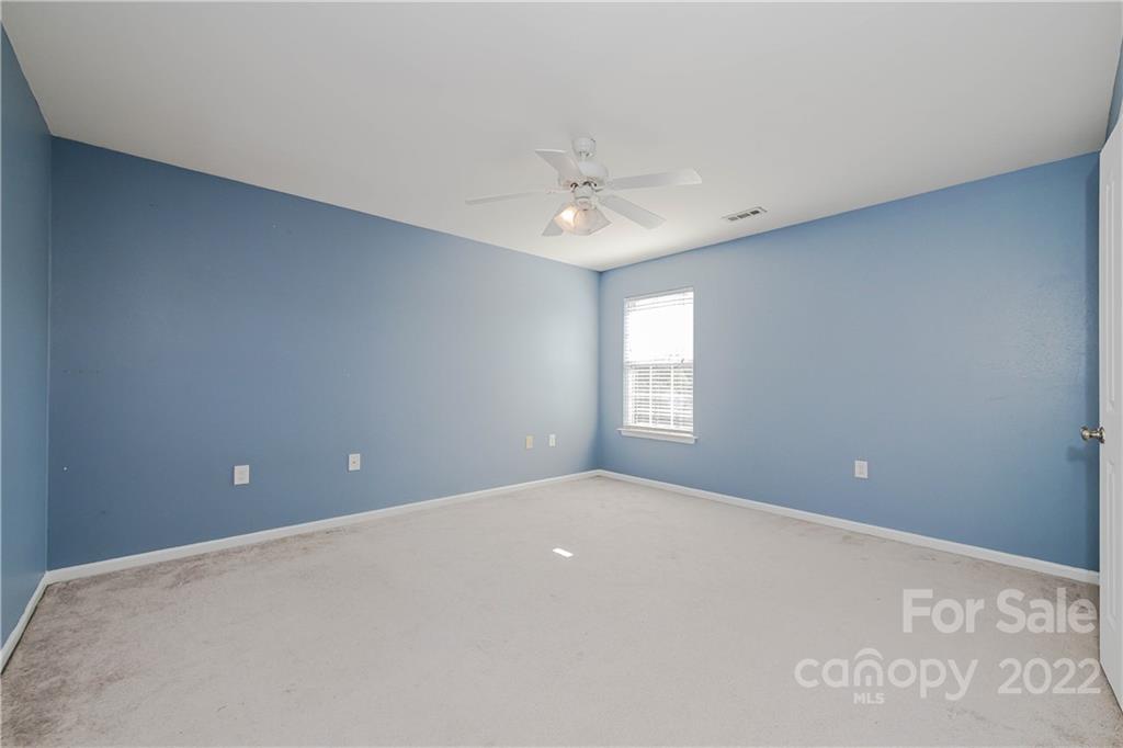 722 Overlook Road Lowell, NC 28098 - Photo 16 of 22 a view of an empty room with a window