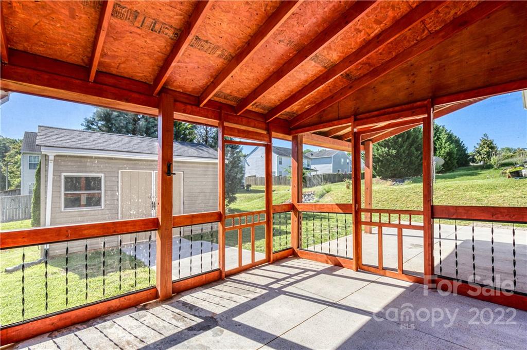 722 Overlook Road Lowell, NC 28098 - Photo 21 of 22 a bedroom with furniture and large windows