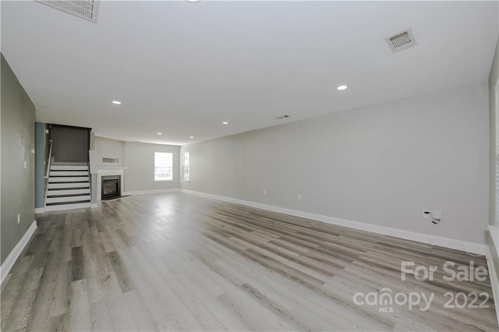 722 Overlook Road Lowell, NC 28098 - Photo 3 of 22 a view of empty room with wooden floor