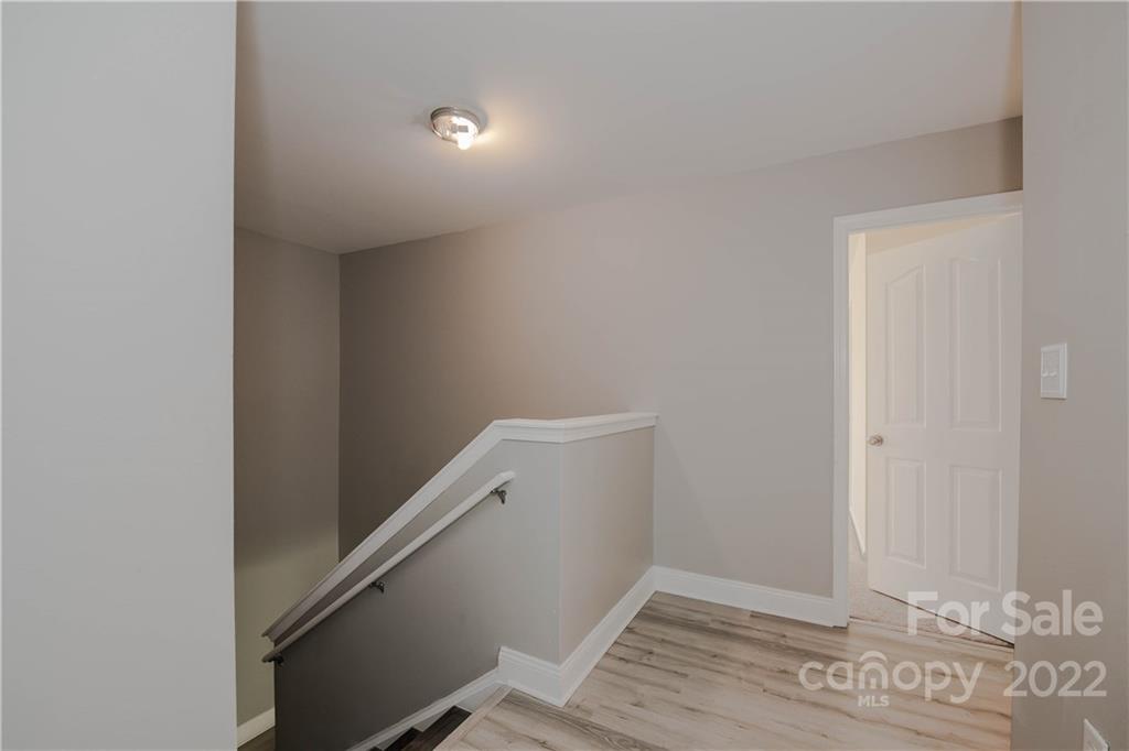 722 Overlook Road Lowell, NC 28098 - Photo 10 of 22 a view of hallway with stairs