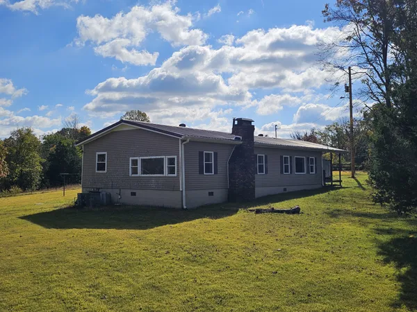 a house view with a garden space