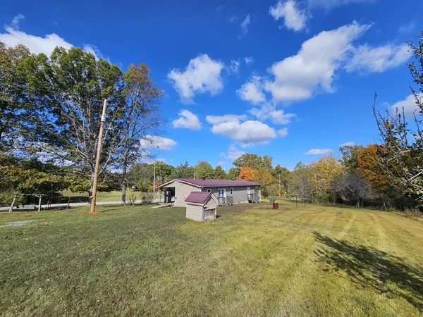 a view of a garden with an outdoor space