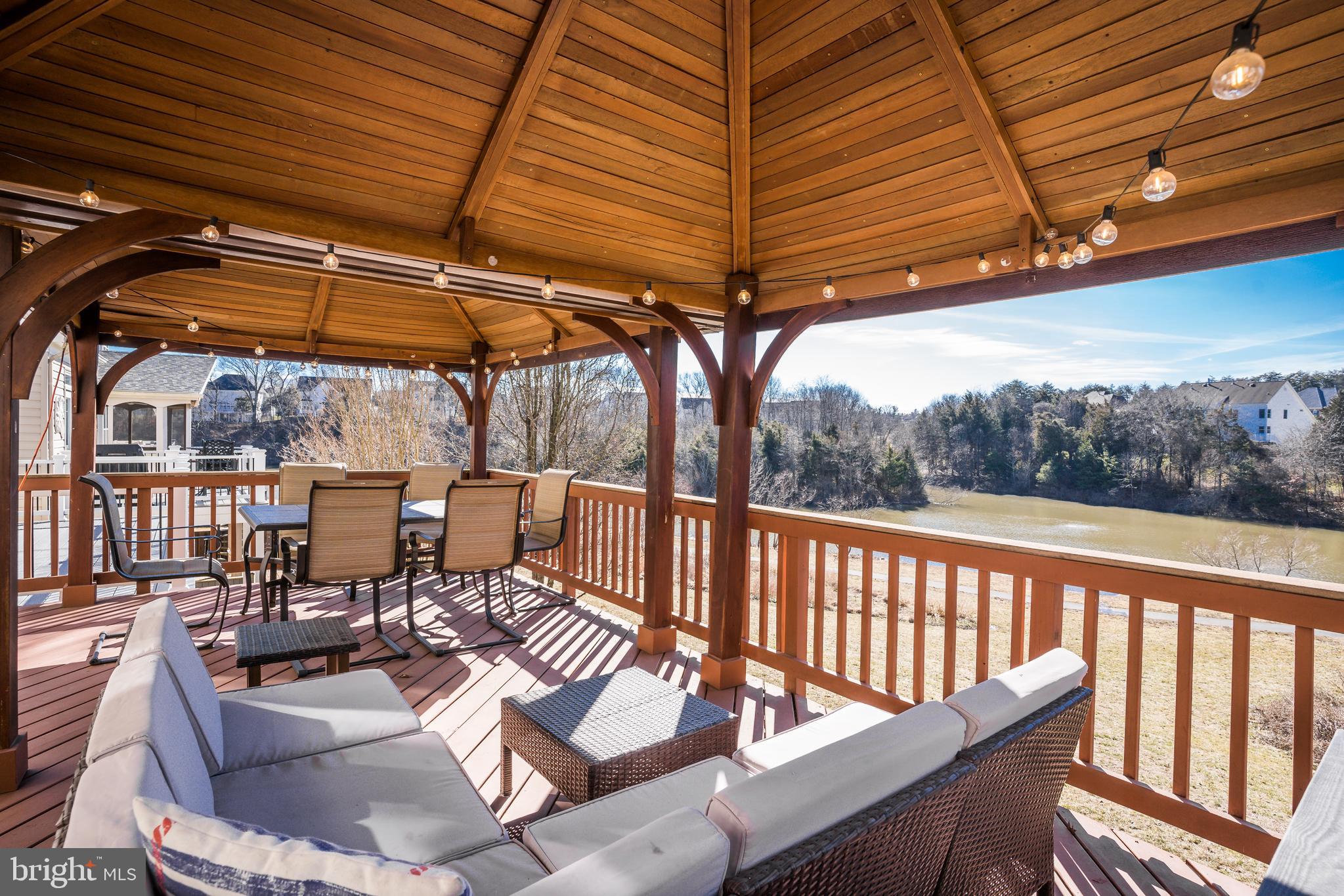 21075 Roaming Shores Terrace Ashburn, VA 20147 - Photo 13 of 43 Deck with lake views