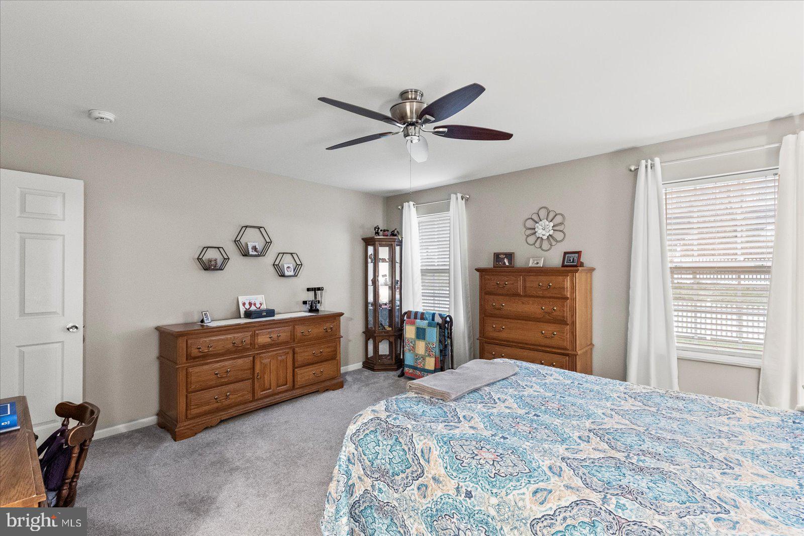 555 Countryside Road Seven Valleys, PA 17360 - Photo 22 of 56 a bed room with a bed and a television
